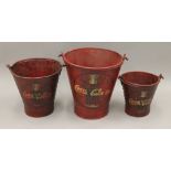 A set of Coke buckets. The largest 33 cm high.