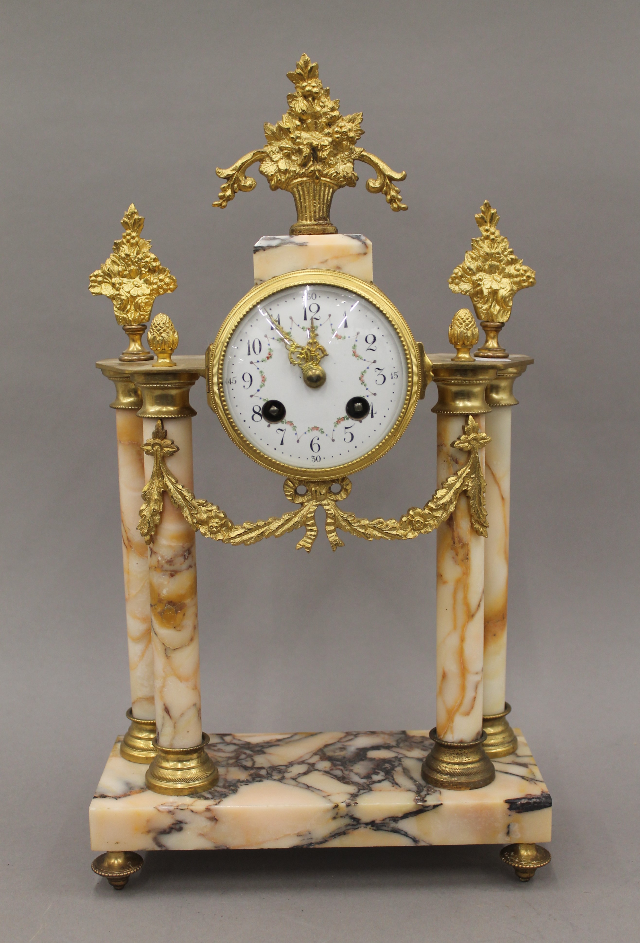 A marble and ormolu clock garniture with pendulum and key, with enamel dial and striking movement. - Image 2 of 14