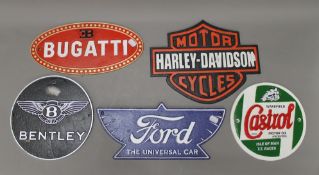 Five cast iron motoring signs.