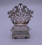 A miniature Russian silver chair, inscribed 'A friend in need is a friend indeed, S.R.T. 1893'. 7.