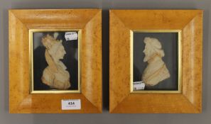 Two framed wax profiles, Elizabeth I and The Earl of Essex. Each 18.5 x 20.5 cm overall.