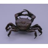 A large bronze model of a crab.