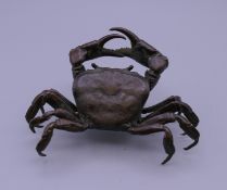 A large bronze model of a crab.