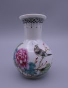 An early 20th century Chinese porcelain vase. 7.25 cm high.