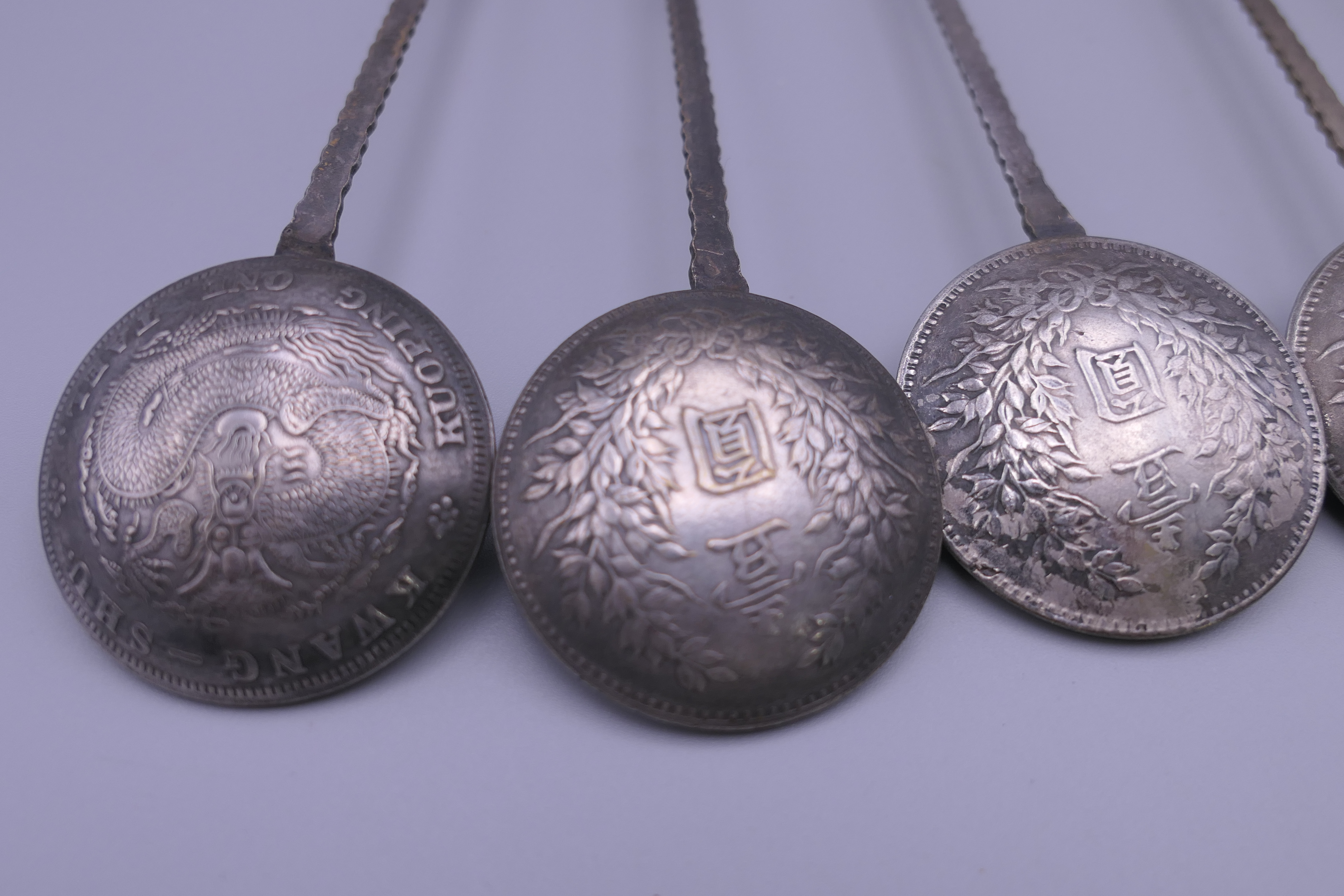 Six Chinese silver coin spoons. 17 cm long. - Image 11 of 11