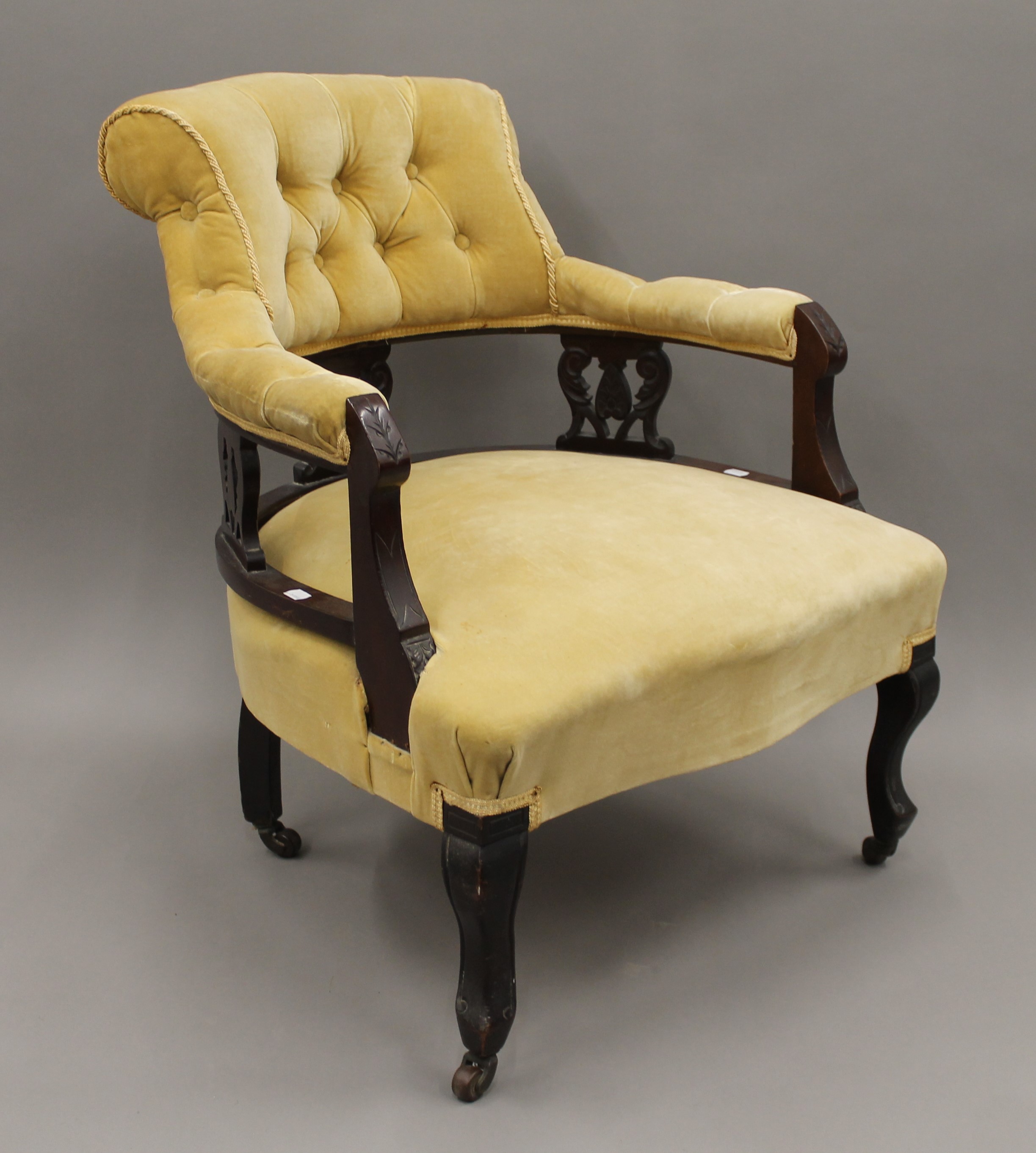 A Victorian upholstered open armchair. 63 cm wide. - Image 3 of 6