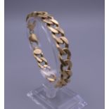 An 18 ct gold link bracelet. 20 cm long. 55.3 grammes.