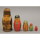 A set of Russian babushka dolls. 13 cm high.