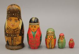 A set of Russian babushka dolls. 13 cm high.