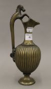 A Grand Tour bronze ewer. 26 cm high.