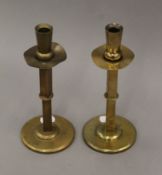 A pair of Arts & Crafts brass candlesticks. 21.5 cm high.