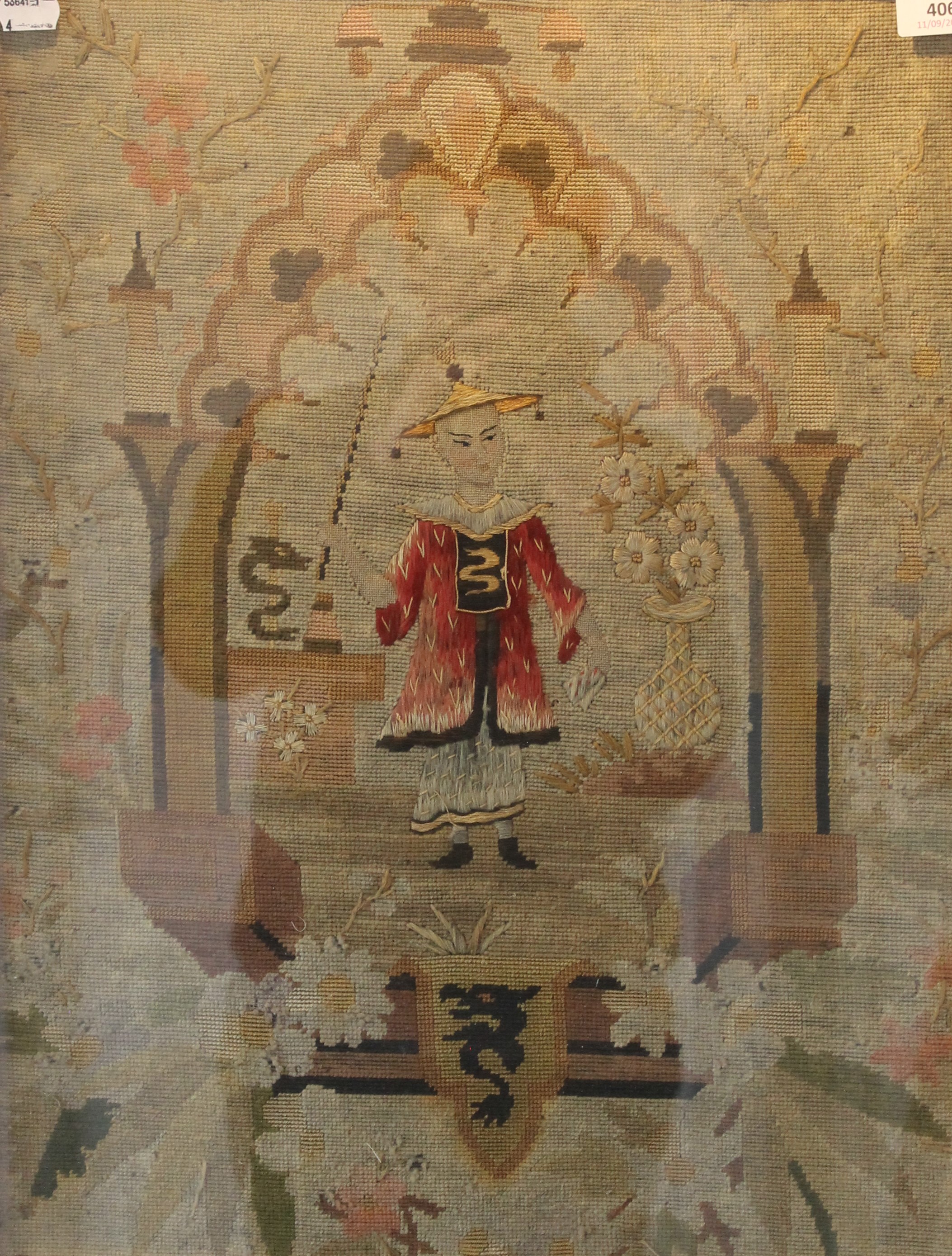 A 19th century framed woolwork depicting a Chinaman, framed and glazed. 48 x 60.5 cm overall.