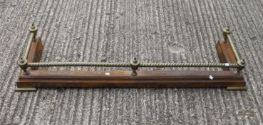 A Victorian brass and iron fender. 140 cm long.