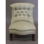 A Victorian upholstered nursing chair. 57 cm wide.