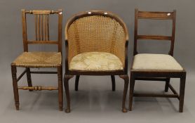 A 19th century elm rush seated Country chair, an oak Country chair and a bergere tub chair.