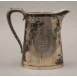 A Victorian silver presentation jug. 11.5 cm high. 218.9 grammes.