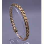 An 18 ct gold link bracelet. 21 cm long. 39.2 grammes.