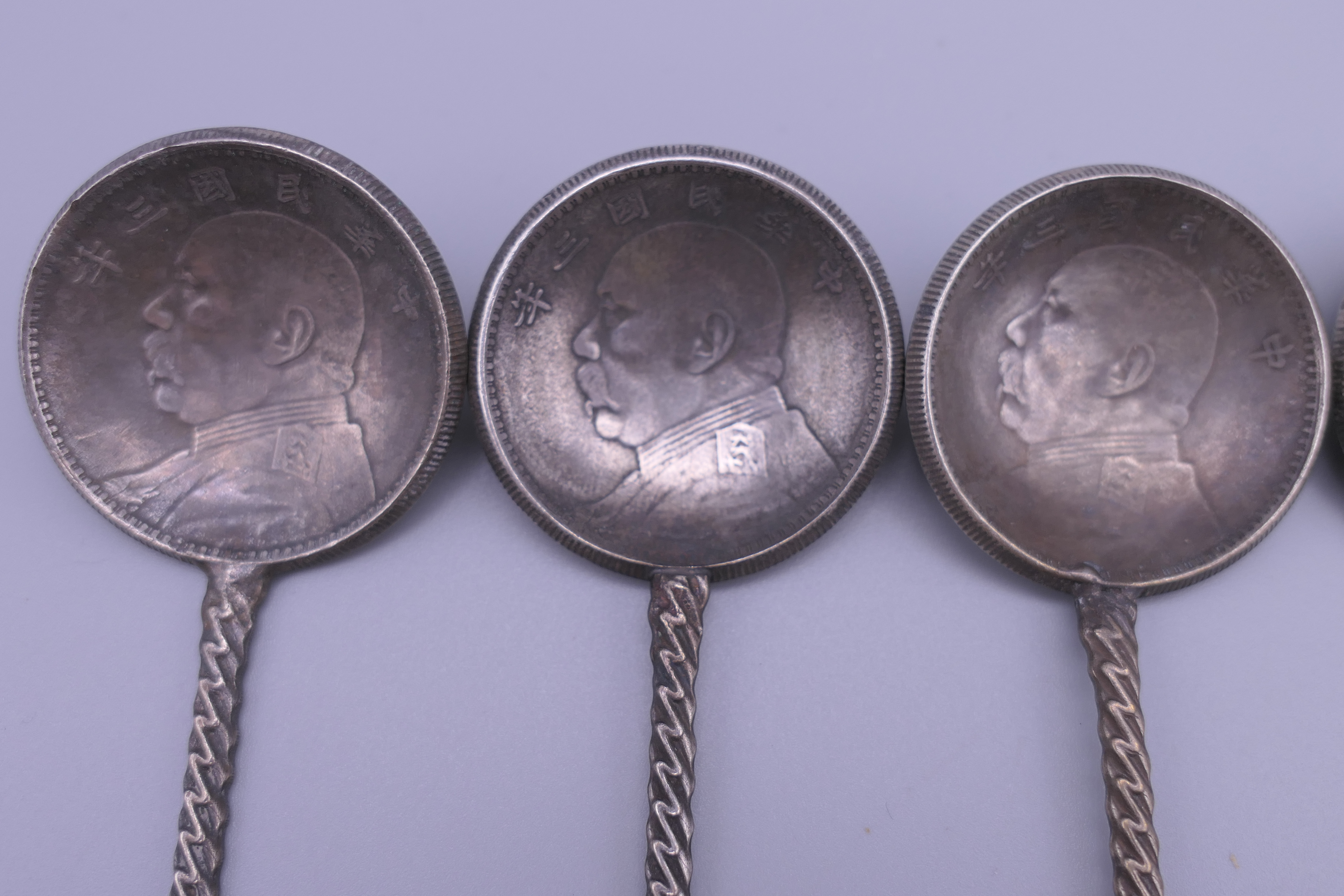 Six Chinese silver coin spoons. 17 cm long. - Image 2 of 11