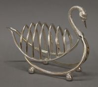 A silver plated toast rack formed as a swan. 21.5 cm long.