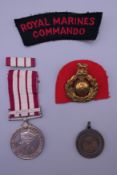 A Royal Marine Malaya medal awarded to RM 7015 D.J.C. BRETT MNE R.M., etc.