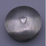 A Dutch silver round pill box. 5 cm diameter. 24.6 grammes.