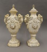 A pair of late 19th/early 20th century French plaster vases. Each 48.5 cm high.