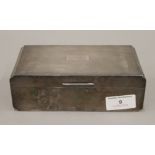 A silver cigarette box. 17 cm wide. 509 grammes total weight.