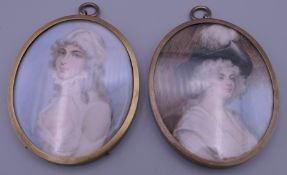 A pair of brass oval framed miniatures. Each 8 x 6.5 cm excluding suspension loop.