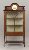 An Edwardian inlaid mahogany glazed display cabinet. 76 cm wide.