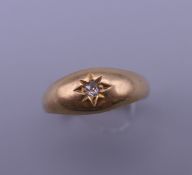 An 18 ct gold diamond gypsy ring. 3.5 grammes total weight.