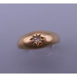 An 18 ct gold diamond gypsy ring. 3.5 grammes total weight.