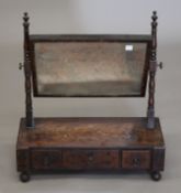 A 19th century mahogany three drawer toilet mirror.