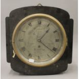 An oak cased wall clock with earlier movement,