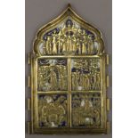 An 18th century Russian brass triptych of typical form with white and blue enamels, lacking sides.