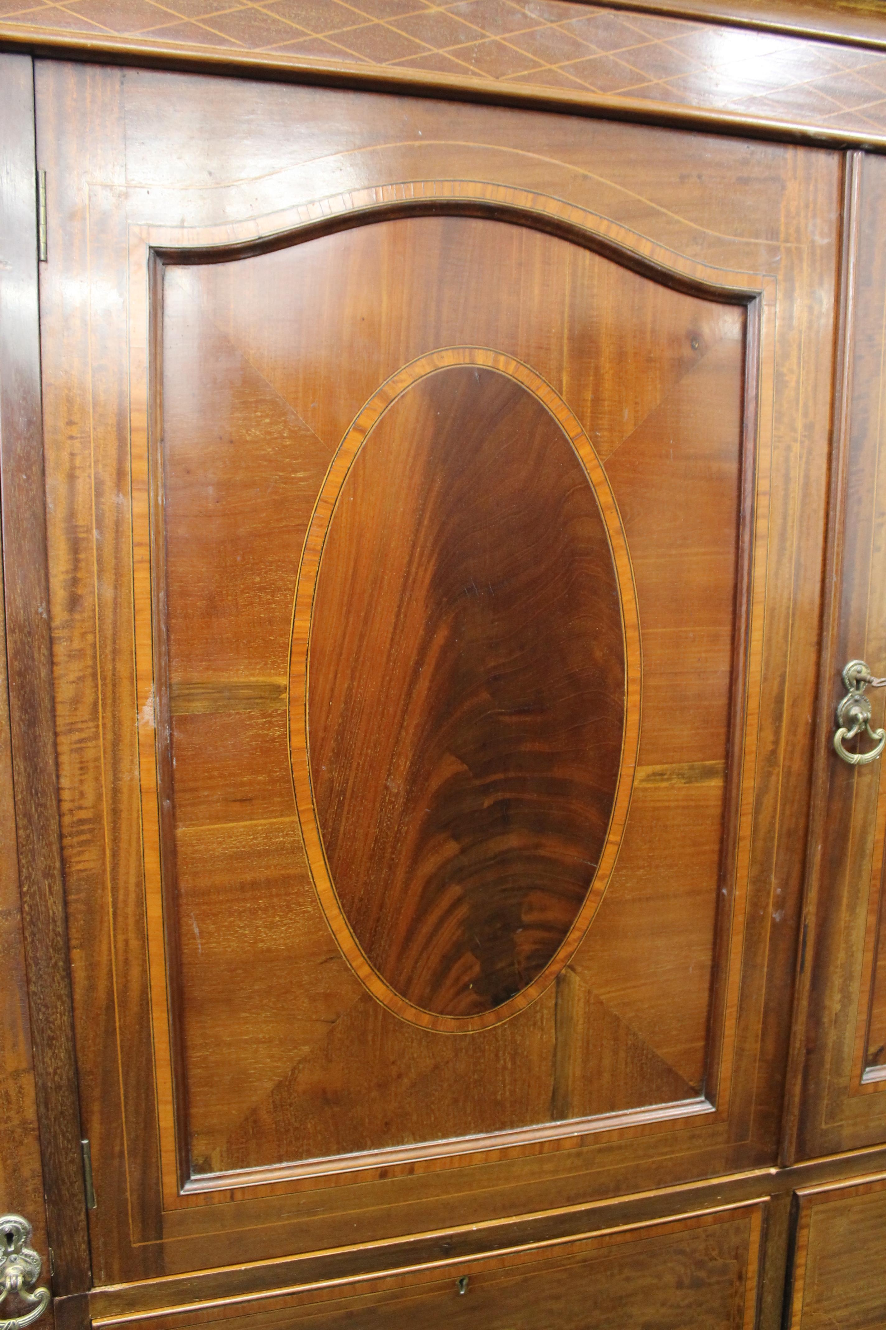 An Edwardian inlaid mahogany compactum wardrobe. 182 cm wide. - Image 7 of 7