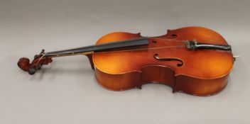 A 3/4 sized cello. 120 cm high.