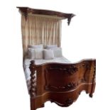 A Victorian mahogany half tester bed. Fabric not included. 196 cm wide.