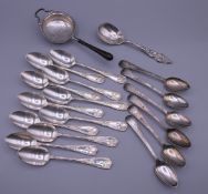 A set of six Georgian silver teaspoons, a silver strainer and a quantity of Christofle teaspoons.