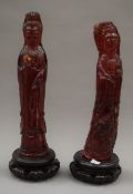 A pair of Chinese models of Guanyin, each mounted on a wooden plinth base. 22 cm high.