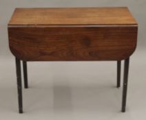 A 19th century mahogany Pembroke table. 85.5 cm long.