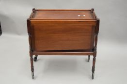 An early 20th century mahogany tea trolley. 75.5 cm long.