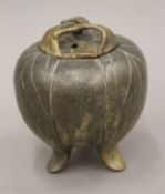 A Chinese bronze peach form lidded censer. 11 cm high.