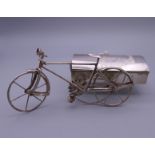 A 925 silver model of a bike and side car. 12.5 cm long.