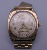 A Limit 9 ct gold gentlemen's wristwatch. 39.4 grammes total weight.