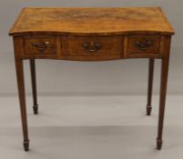 A 19th century mahogany Serpentine side table. 86 cm wide.