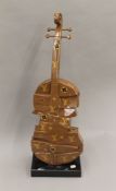 An abstract model of a violin. 77 cm high.