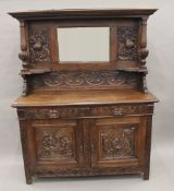 A 19th century carved oak mirror back sideboard. 149 cm wide.