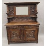 A 19th century carved oak mirror back sideboard. 149 cm wide.