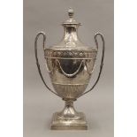 A large silver lidded trophy with military presentation inscription. 49 cm high. 100 troy ounces.