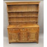 A Victorian pine dresser. 202.5 cm high x 162 cm wide.